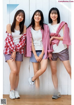 A group of young women posing for a picture together.